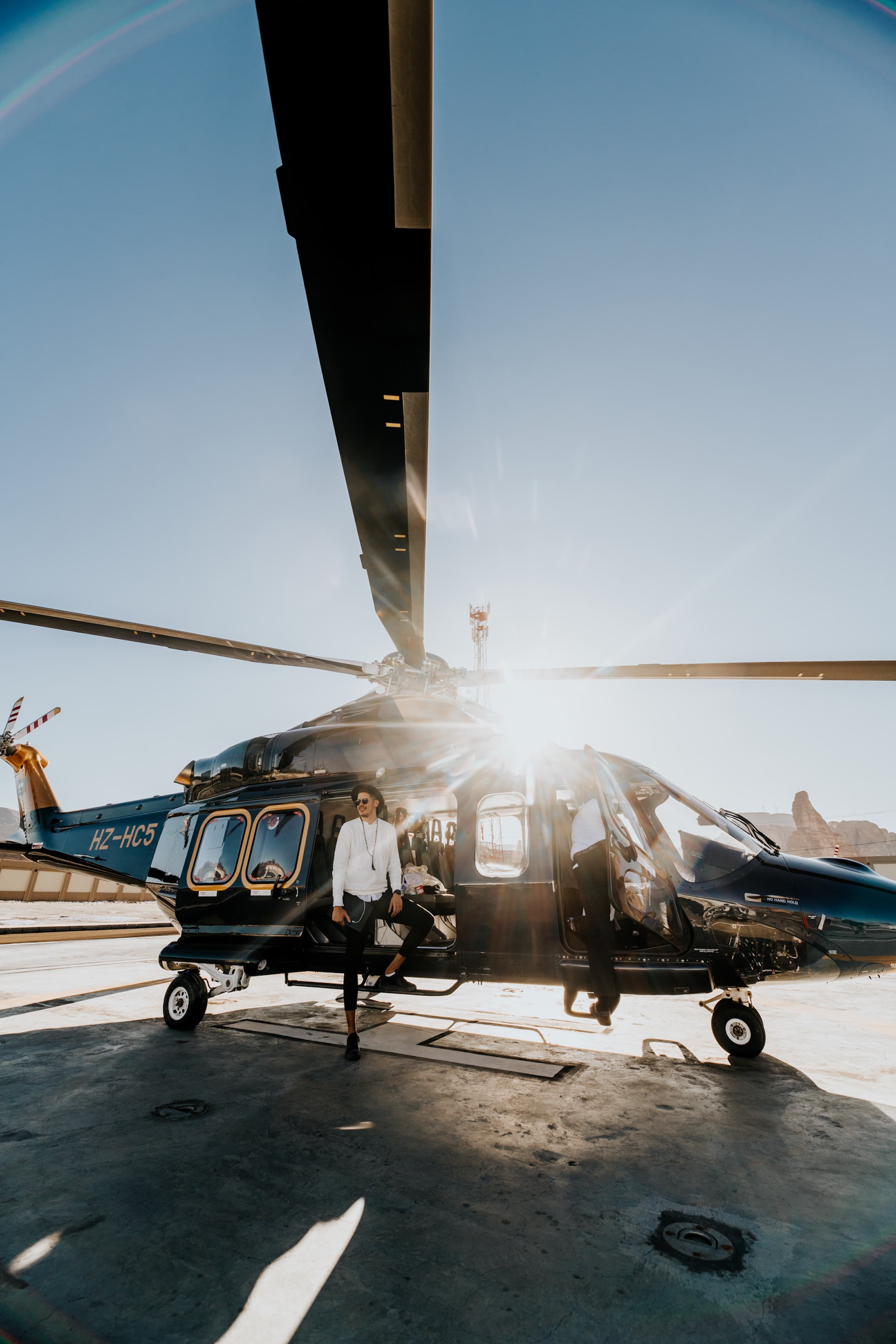 Boarding a private helicopter at golden hour